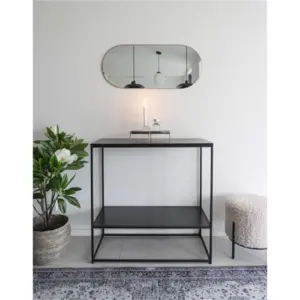 Jersey, spejl ovalt med ramme i messing look 35x80 cm.