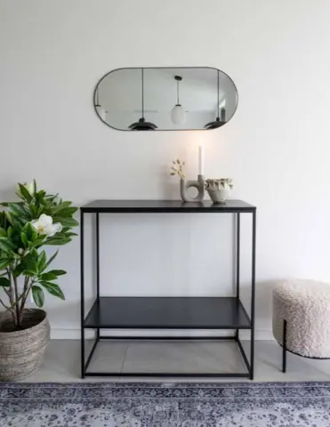 Jersey, spejl ovalt med sort ramme 35x80 cm.