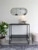 Jersey, spejl ovalt med sort ramme 35x80 cm.